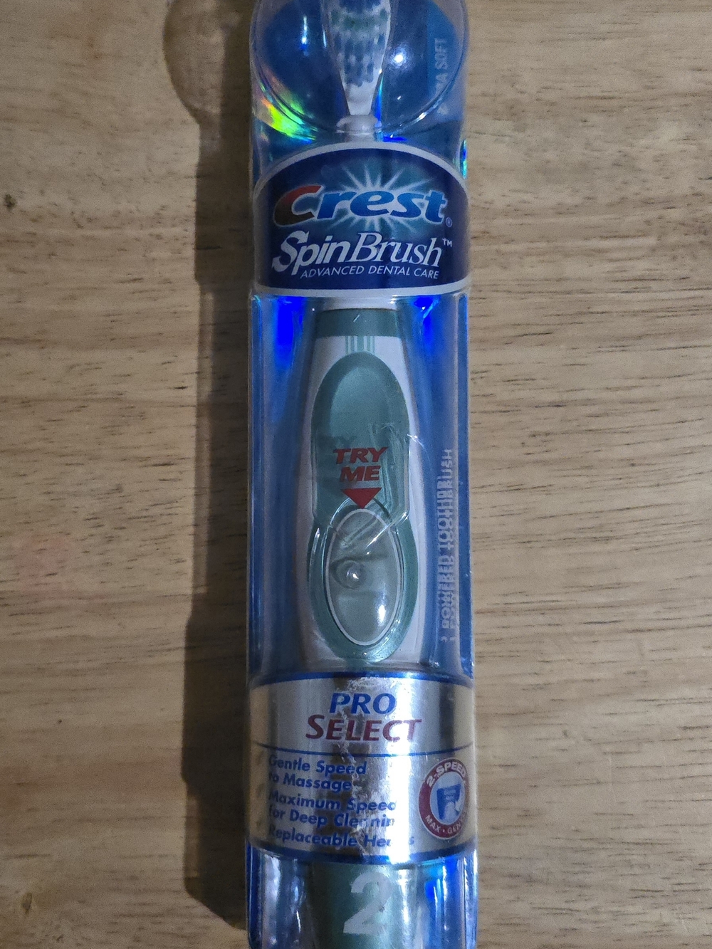 Crest SpinBrush Pro Select Electric Toothbrush in teal and white